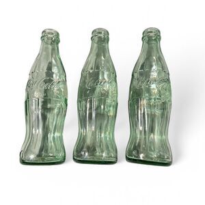 Coca-cola vintage Green Glass 8oz with different cities on bottom of bottles